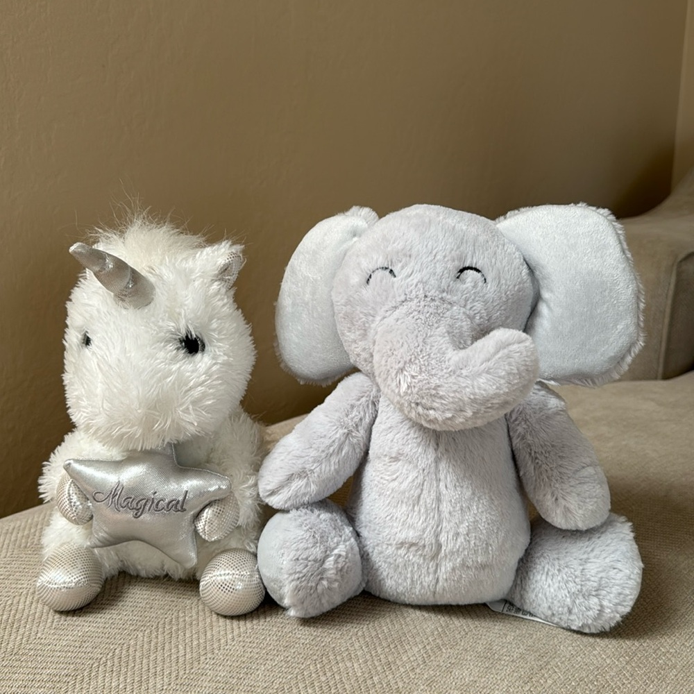 2 small toys unicorn and elephant